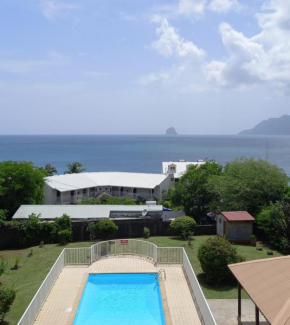 Appartement à Anse Mabouya en rez de jardin avec piscine à proximité des plages